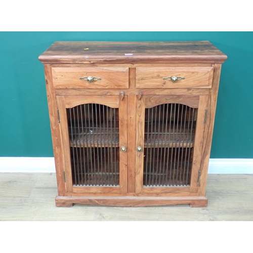 697 - A hardwood Cupboard fitted two frieze drawers above two doors with bars 3ft H x 2ft 11in W