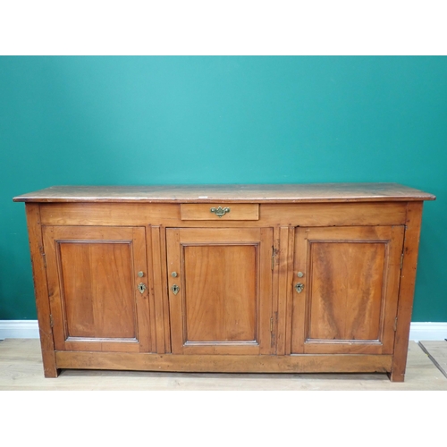 700 - A 19th Century French fruitwood enclosed Dresser Base fitted single frieze drawer above three panell... 