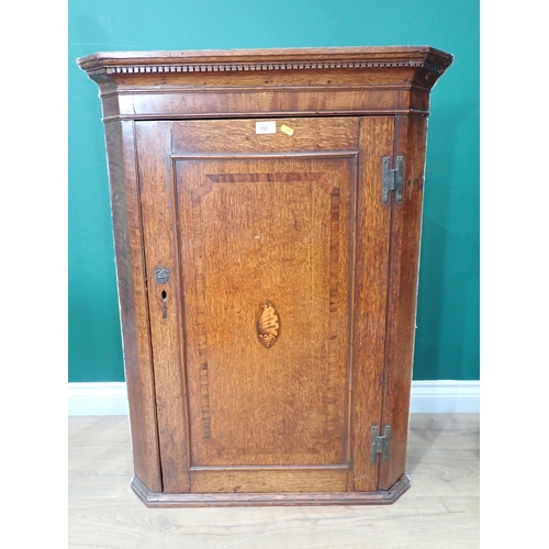 707 - A Georgian oak and shell inlaid hanging Corner Cupboard 3ft 3in H x 2ft 6in W