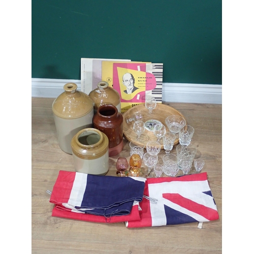 713 - A box of Drinking Glasses, stoneware Flagons and two Union Jack Flags