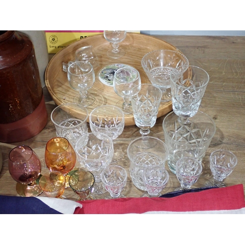 713 - A box of Drinking Glasses, stoneware Flagons and two Union Jack Flags