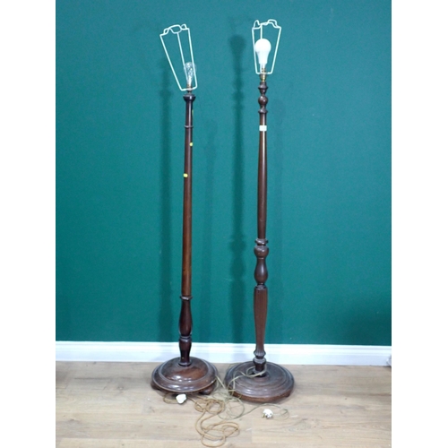 714 - Two mahogany Standard Lamps, failed PAT