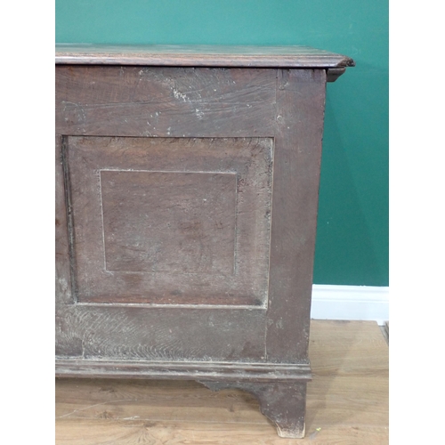 719 - An 18th Century oak Coffer with fielded three panel front mounted on bracket feet 5ft 9in W x 2ft 7i... 