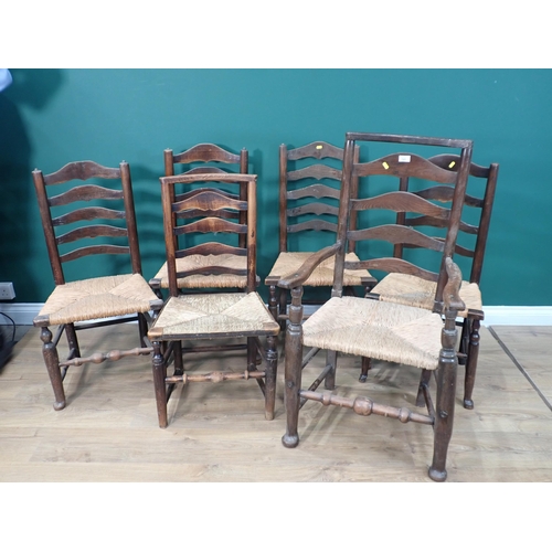 727 - A set of five antique rush seated ladderback Chair, viz; one carver and five singles