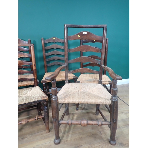 727 - A set of five antique rush seated ladderback Chair, viz; one carver and five singles