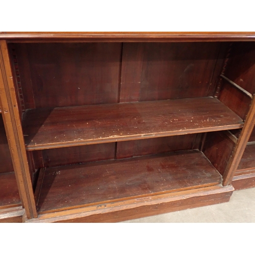 729 - A Victorian walnut breakfront Bookcase of three bays with adjustable shelves 6ft 8in W x 3ft 3in H