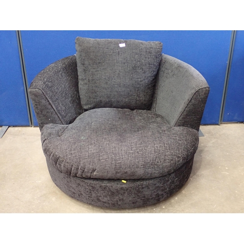 730 - A large swivel Armchair with grey upholstery