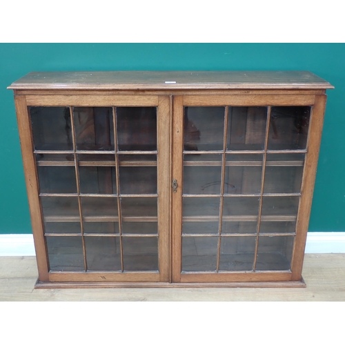 736 - A mahogany and glazed Wall Cabinet with pair of doors enclosing two adjustable shelves, 2ft 11in H x... 