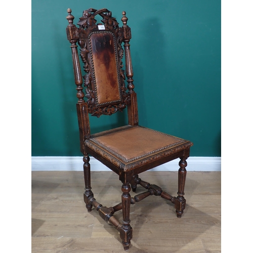 775 - A set of six Victorian carved oak Dining Chairs with fluted turned supports.