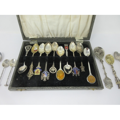 81 - A quantity of silver and plated Souvenir Spoons, some with enamel finials