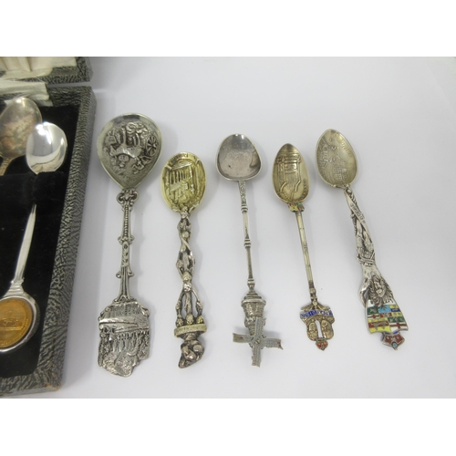 81 - A quantity of silver and plated Souvenir Spoons, some with enamel finials