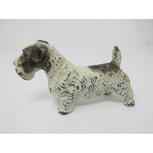 84 - Three painted metal figures of Dogs largest measuring 4