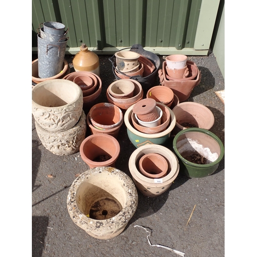 A quantity of concrete, terracotta and glazed Plant Pots
