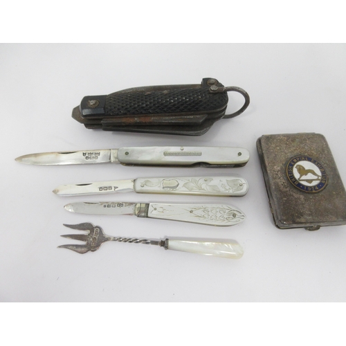 87 - Three Fruit Knives with folding silver blades, a Pickle Fork, a Pen Knife and a plated Vesta Case