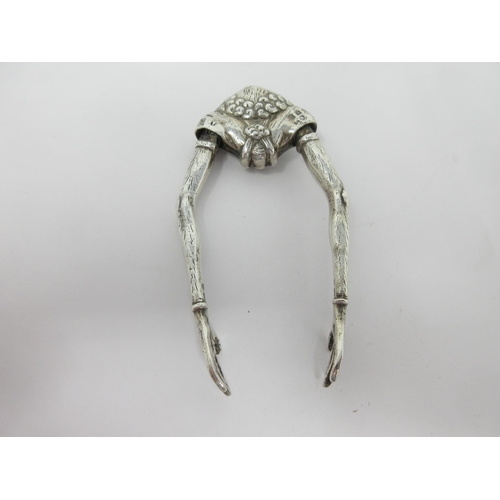 91 - A pair of George V silver unusual Tongs in the form of a mask, arms and hands, London 1926, maker: A... 