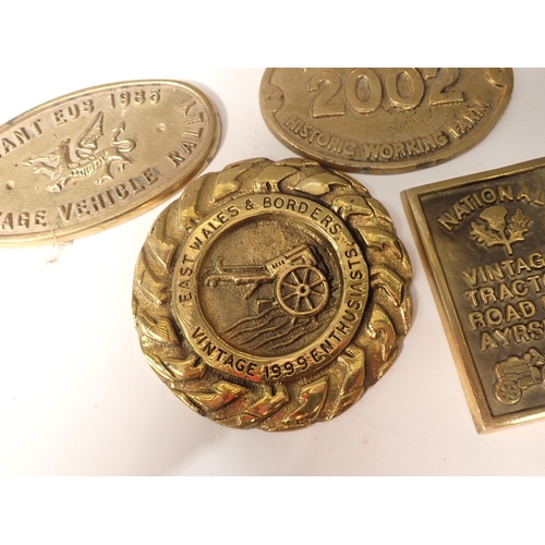 375 - A box of brass Agricultural Society and other Plaques, a Seiko Wall Clock and an oak cased Barometer