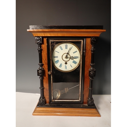 471 - A Victorian walnut and ebonised Mantle Clock and an oak Mantle Clock