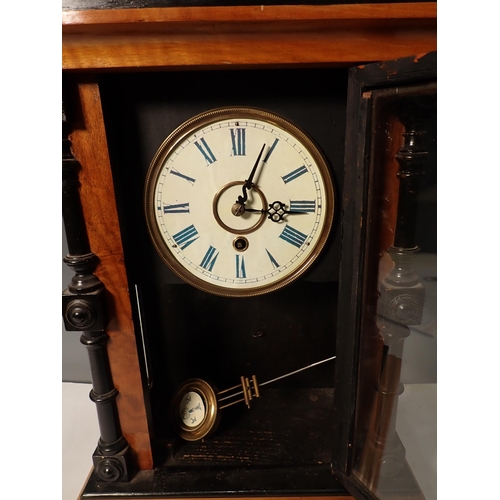 471 - A Victorian walnut and ebonised Mantle Clock and an oak Mantle Clock