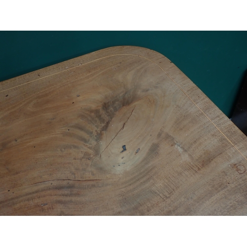 857 - An antique mahogany Occasional Table with rectangular top with rounded corners on turned column and ... 