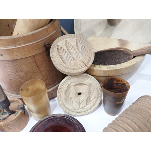 694 - A collection of wooden Kitchen items including butter press, Knives, Rolling Pin, etc.