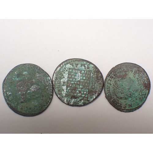 218 - A small collection of Roman Coins and Egyptian antiquities to include a Bes Amulet and three small S... 