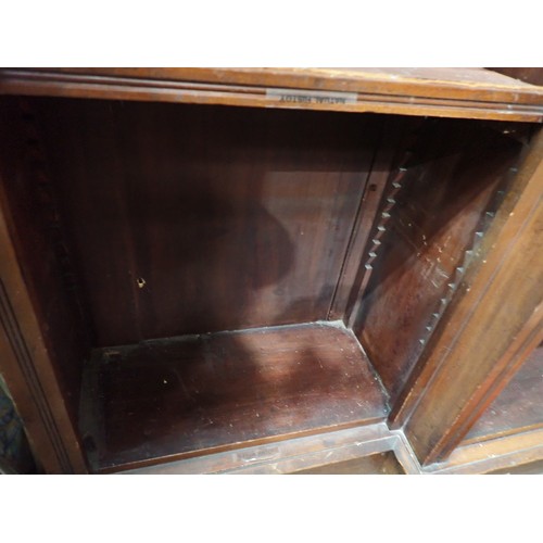 729 - A Victorian walnut breakfront Bookcase of three bays with adjustable shelves 6ft 8in W x 3ft 3in H