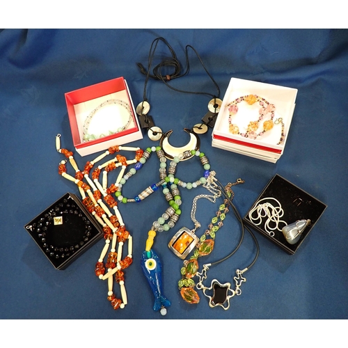 184 - A small collection of Costume Jewellery including; glass bead Necklaces, silver Pendants set amber, ... 