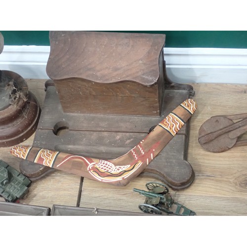 551 - A box containing Desk Stand, Boomerang, metal female Sculpture, Prints, etc.