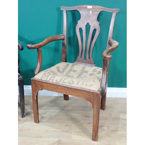 10 - A Georgian pierced splat back Elbow Chair and a 19th Century oak Elbow Chair