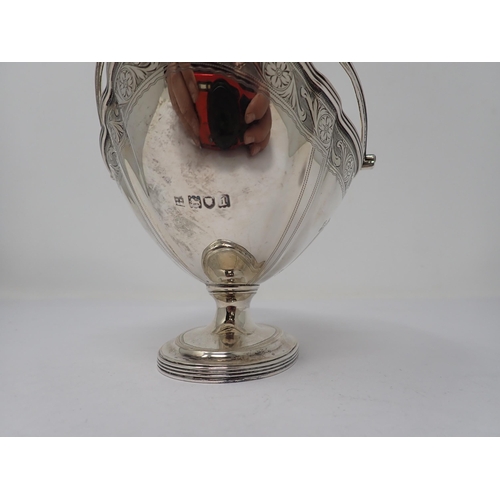 101 - An Edward VII silver shaped oval Basket with engraved frieze, vacant shield cartouches on pedestal b... 