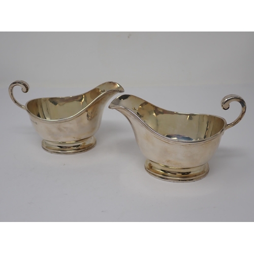 105 - A pair of Edward VIII silver Sauce Boats on oval bases, Birmingham 1936, 370gms