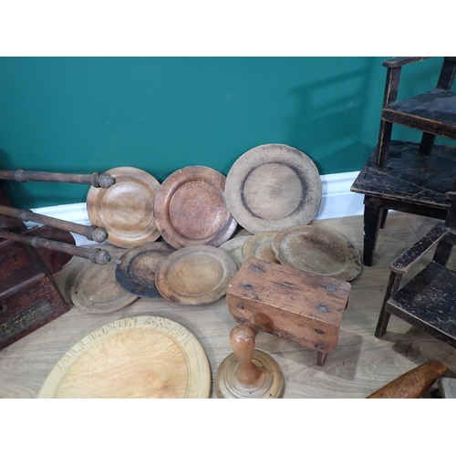 11 - A Doll's Kitchen Table and two Chairs, another Chair, various treen Bread Boards, treen Ladle, Teleg... 