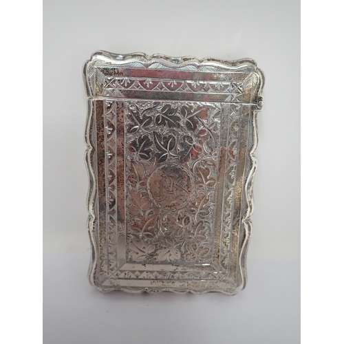 119 - A Victorian silver Card Case with vine leaf engraving, cartouche with initials, Birmingham 1882, mak... 