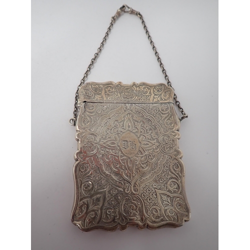 142 - A Victorian silver Card Case with strapwork engraving, initials DH within oval cartouche, Birmingham... 