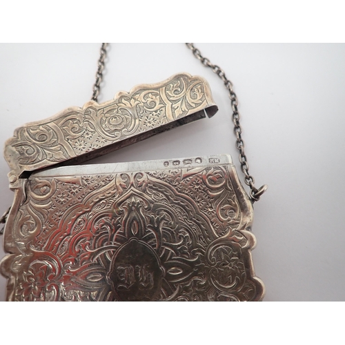 142 - A Victorian silver Card Case with strapwork engraving, initials DH within oval cartouche, Birmingham... 