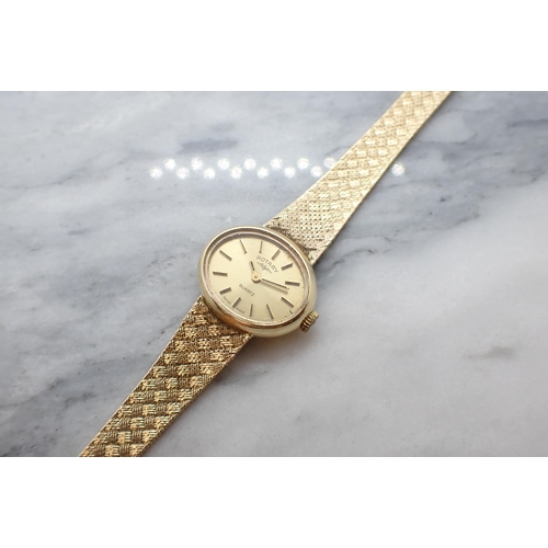 151 - A lady's Rotary Wristwatch the elliptical dial with hourly baton markers in 9ct gold case on 9ct gol... 