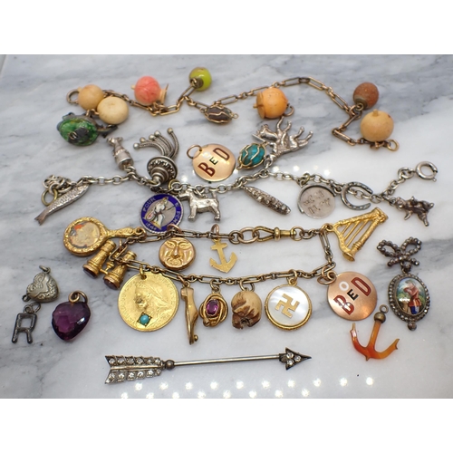 158 - A paste-set Jabot Pin stamped silver and a collection of Charms and Fobs