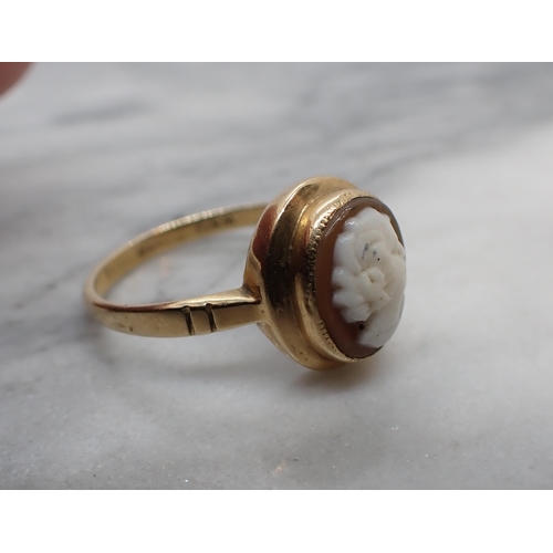 163 - A carved shell Cameo Ring of bust in profile in 9ct gold, ring size N 1/2, approx 2.40gms