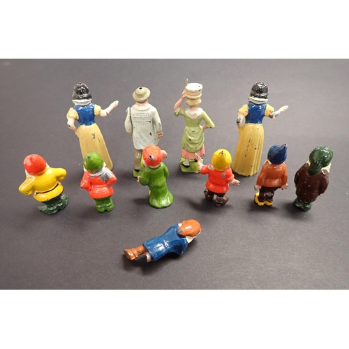 201 - Two Britains die-cast Figures; milkmaid and farmer, a set of Snow White and the Seven Dwarfs die-cas... 