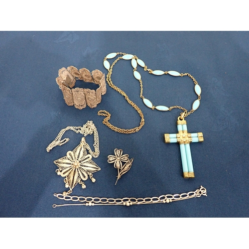 216 - A turquoise opaline glass Cross and Chain, three pieces of silver filigree and two Bracelets