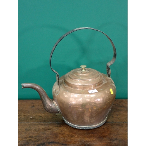 26 - A large antique copper Kettle 1ft 5in H