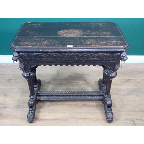 315 - A Victorian carved oak Library Table with leafage frieze and lion masks on reeded end supports and s... 