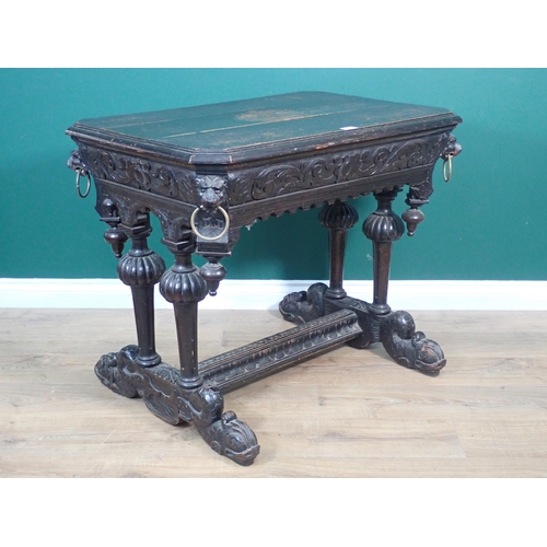 315 - A Victorian carved oak Library Table with leafage frieze and lion masks on reeded end supports and s... 