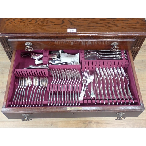 318 - An oak veneered Table Canteen fitted with two drawers of plated cutlery 2ft 7in H x 2ft 3in W