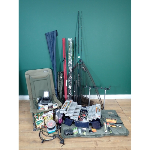 324 - A quantity of Fishing Tackle including Abu Garcia Feeder Rod, Carp Rod, Boat Rod, specimen Landing N... 