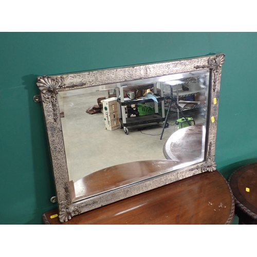 333 - A hammered metal framed Wall Mirror, a mahogany oval Centre Table on cabriole supports and claw and ... 