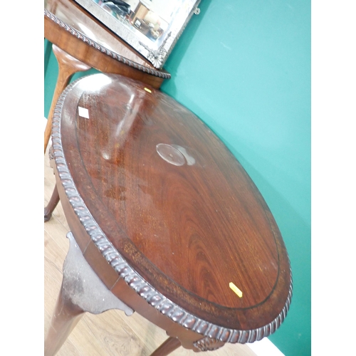 333 - A hammered metal framed Wall Mirror, a mahogany oval Centre Table on cabriole supports and claw and ... 