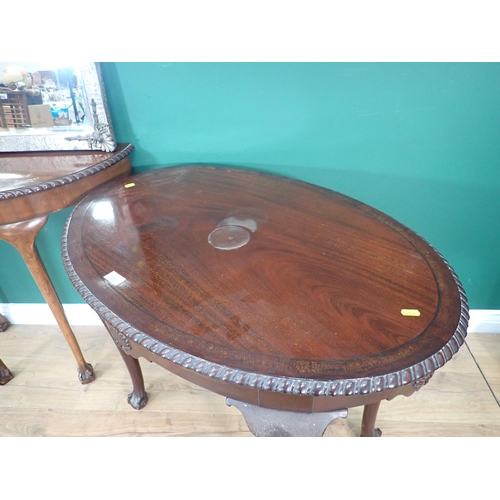 333 - A hammered metal framed Wall Mirror, a mahogany oval Centre Table on cabriole supports and claw and ... 