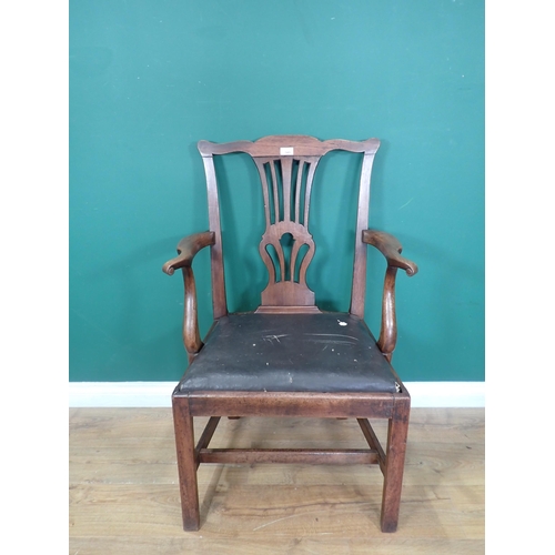 349 - A Georgian walnut pierced splat back Elbow Chair