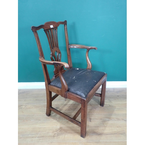 349 - A Georgian walnut pierced splat back Elbow Chair